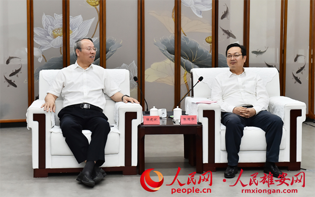 張國華與中國科學院院士雒建斌一行舉行工作座談。劉向陽攝